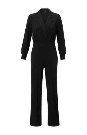 Black jumpsuit with long sleeves and wide legs